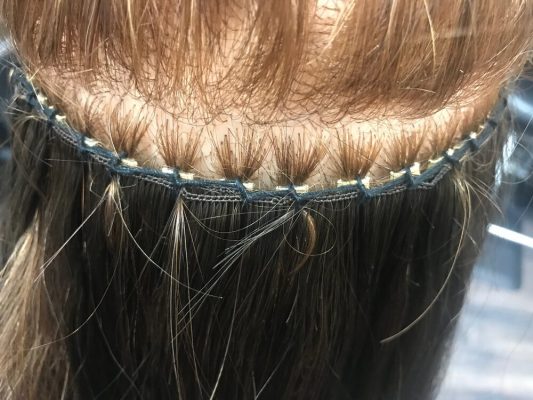 Hand-tied wefts